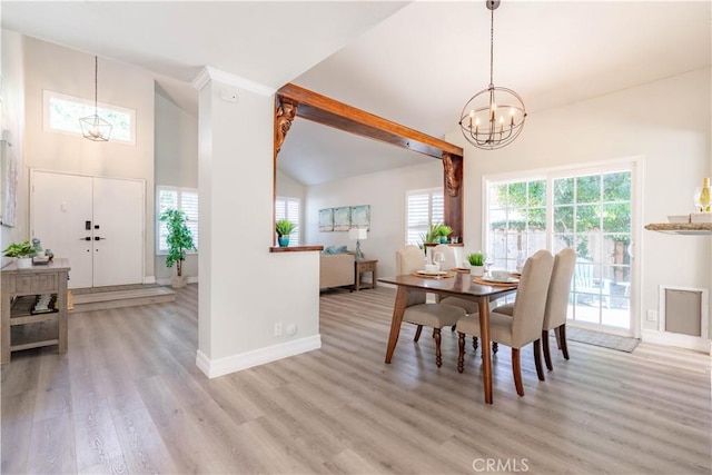 24046 Lindley St, Mission Viejo, CA 92691 - dining space featuring a chandelier, light wood-style floors, and high vaulted ceiling