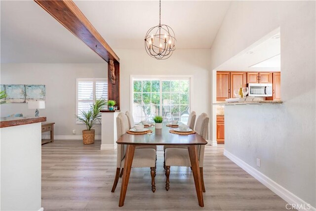 24046 Lindley St, Mission Viejo, CA 92691 - dining area with a chandelier and light wood finished floors