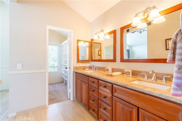 24046 Lindley St, Mission Viejo, CA 92691 - full bathroom featuring lofted ceiling and double vanity