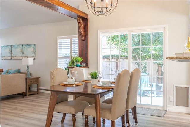 24046 Lindley St, Mission Viejo, CA 92691 - dining area featuring a chandelier and light wood-style flooring