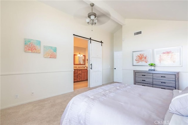 24046 Lindley St, Mission Viejo, CA 92691 - bedroom featuring a barn door, beam ceiling, light carpet, ensuite bath, and high vaulted ceiling