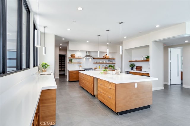 1912 Edgefair Ln, Redlands, CA 92373 - kitchen with open shelves, modern cabinets, wall chimney exhaust hood, light countertops, and recessed lighting
