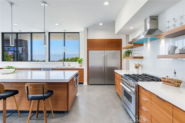 1912 Edgefair Ln, Redlands, CA 92373 - kitchen featuring high end appliances, open shelves, modern cabinets, exhaust hood, and recessed lighting