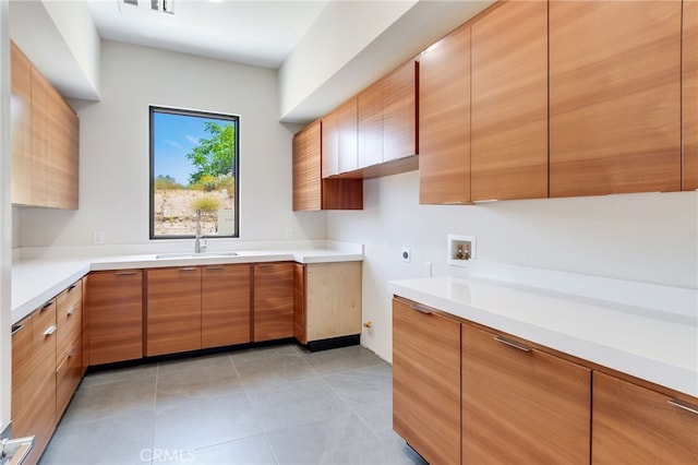 1912 Edgefair Ln, Redlands, CA 92373 - kitchen featuring modern cabinets, light tile patterned floors, and light countertops