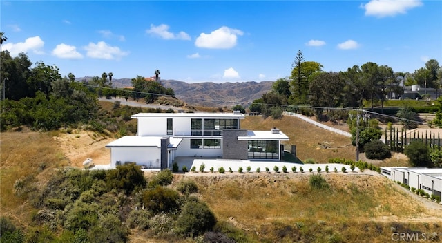 1912 Edgefair Ln, Redlands, CA 92373 - back of property with a mountain view and a patio area