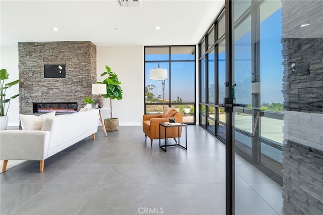 1912 Edgefair Ln, Redlands, CA 92373 - tiled living room with floor to ceiling windows, a stone fireplace, and french doors