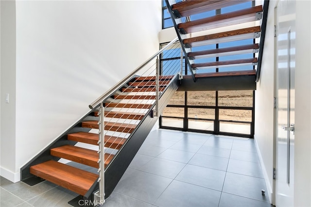 1912 Edgefair Ln, Redlands, CA 92373 - staircase featuring baseboards and tile patterned floors
