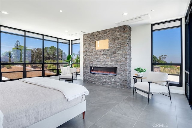 1912 Edgefair Ln, Redlands, CA 92373 - bedroom with a wall of windows, a fireplace, and tile patterned floors