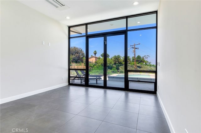 1912 Edgefair Ln, Redlands, CA 92373 - tiled empty room with expansive windows and french doors