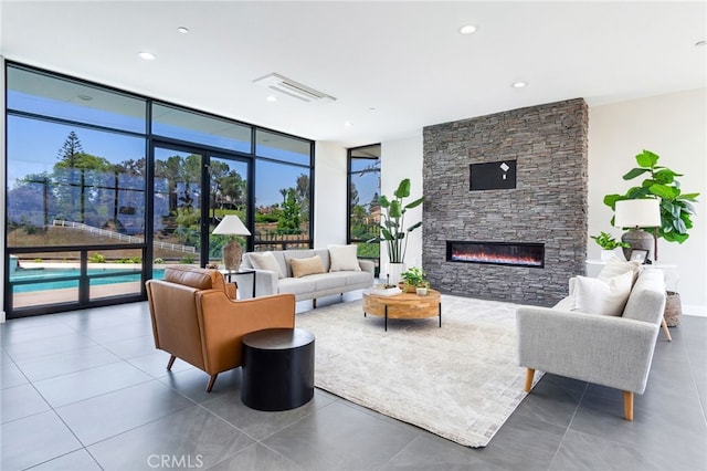1912 Edgefair Ln, Redlands, CA 92373 - living area with floor to ceiling windows, a fireplace, and tile patterned flooring