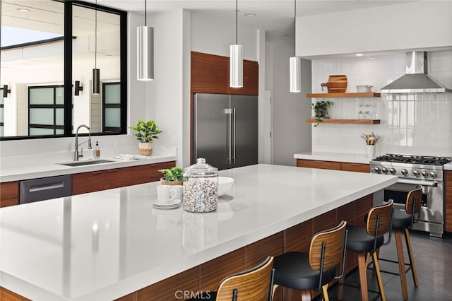 1912 Edgefair Ln, Redlands, CA 92373 - kitchen with premium appliances, wall chimney exhaust hood, modern cabinets, tasteful backsplash, and light countertops