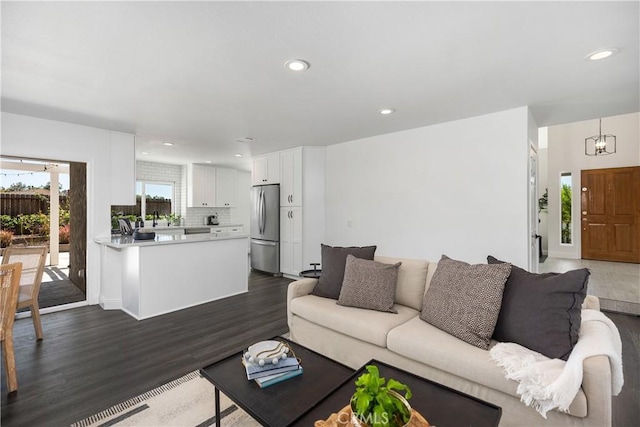 24532 La Cienega St, Laguna Hills, CA 92653 - living room with recessed lighting and dark wood-style floors