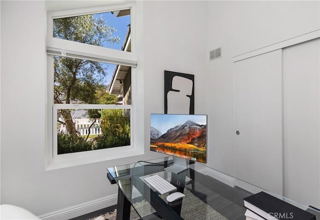24532 La Cienega St, Laguna Hills, CA 92653 - home office featuring a towering ceiling and baseboards