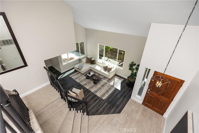 24532 La Cienega St, Laguna Hills, CA 92653 - living room with high vaulted ceiling and wood finished floors