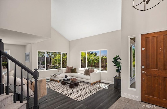 24532 La Cienega St, Laguna Hills, CA 92653 - entrance foyer with high vaulted ceiling, wood finished floors, stairway, and a chandelier