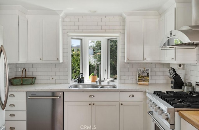 484 E 16th St, Costa Mesa, CA 92627 - kitchen featuring stainless steel dishwasher, ventilation hood, stove, white cabinetry, and backsplash