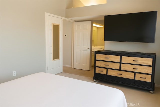 14016 Las Entradas, Bakersfield, CA 93314 - bedroom featuring light colored carpet and ensuite bath
