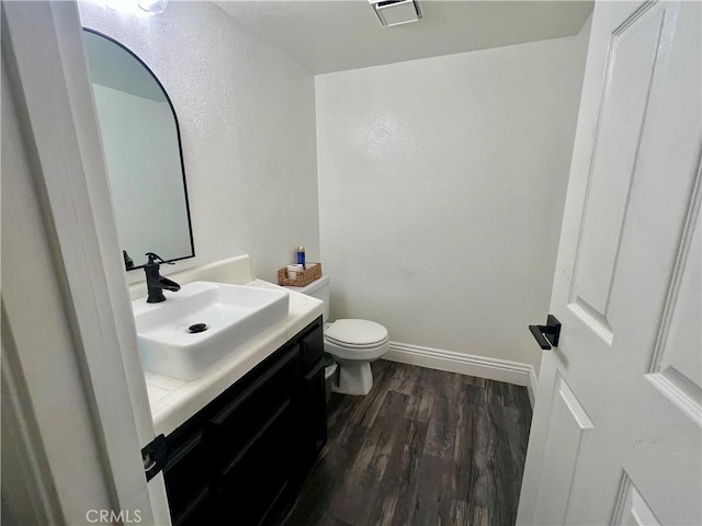 14016 Las Entradas, Bakersfield, CA 93314 - half bath with vanity and wood finished floors