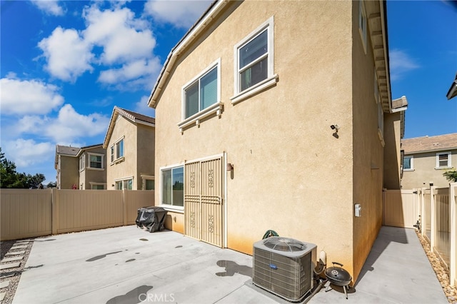 872 Bluebell Way, Beaumont, CA 92223 - rear view of property featuring stucco siding, a patio area, and a fenced backyard