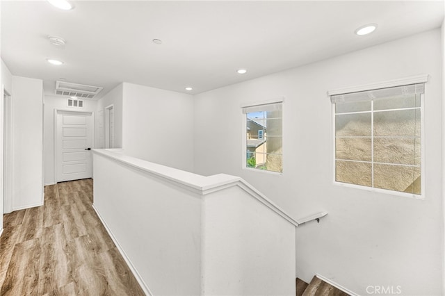 872 Bluebell Way, Beaumont, CA 92223 - corridor featuring an upstairs landing, light wood finished floors, and recessed lighting