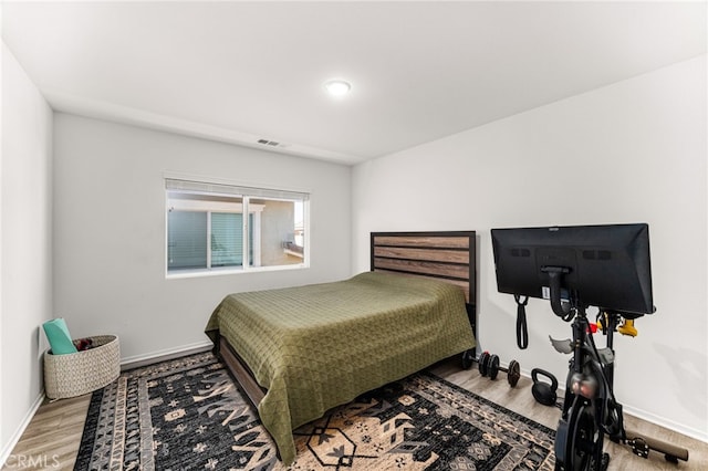 872 Bluebell Way, Beaumont, CA 92223 - bedroom with wood finished floors and baseboards