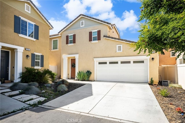 872 Bluebell Way, Beaumont, CA 92223 - view of front of property with concrete driveway, stucco siding, and a garage