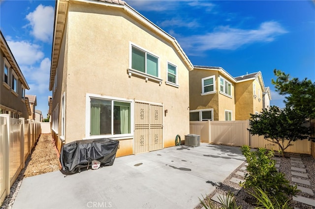 872 Bluebell Way, Beaumont, CA 92223 - rear view of house featuring stucco siding and a patio