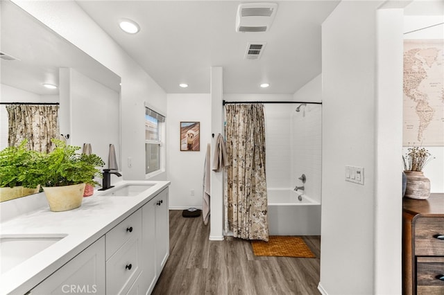 872 Bluebell Way, Beaumont, CA 92223 - full bath with wood finished floors, double vanity, shower / tub combo with curtain, and recessed lighting