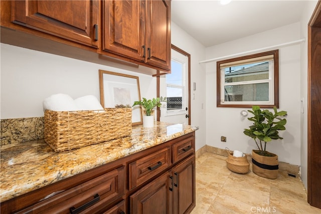5116 Faust Ave, Lakewood, CA 90713 - laundry room featuring baseboards