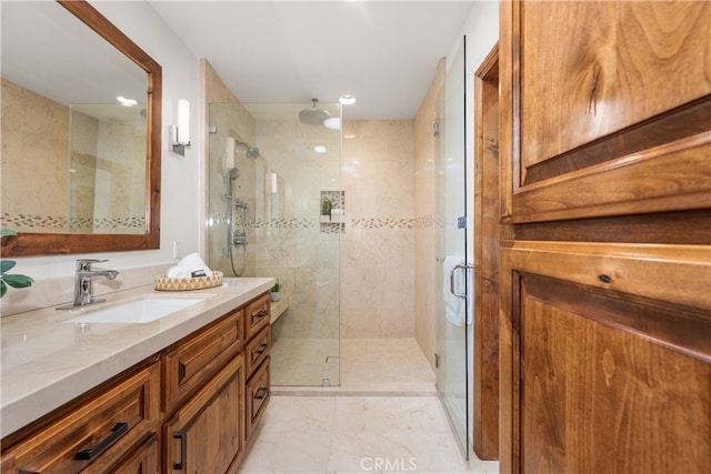 5116 Faust Ave, Lakewood, CA 90713 - full bathroom featuring vanity, a stall shower, and marble look tile flooring