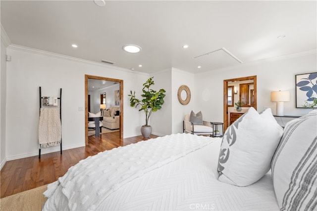 5116 Faust Ave, Lakewood, CA 90713 - bedroom with attic access, wood finished floors, recessed lighting, and ornamental molding