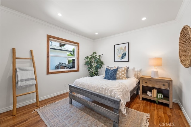 5116 Faust Ave, Lakewood, CA 90713 - bedroom with wood finished floors, ornamental molding, and recessed lighting