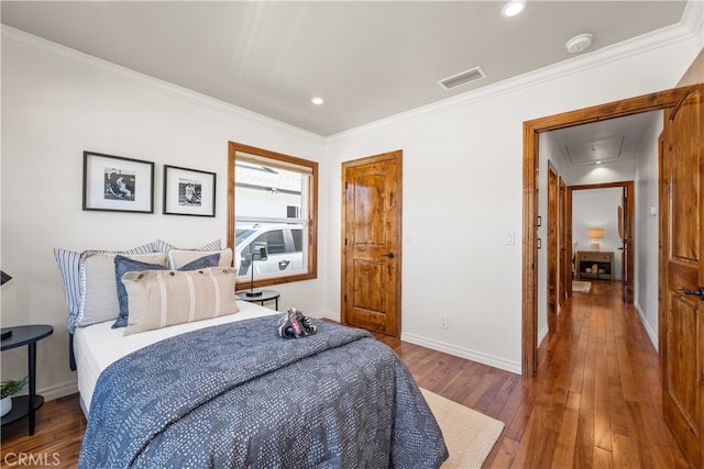 5116 Faust Ave, Lakewood, CA 90713 - bedroom with attic access, hardwood / wood-style flooring, ornamental molding, and recessed lighting
