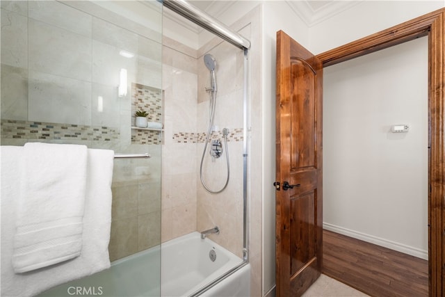 5116 Faust Ave, Lakewood, CA 90713 - bathroom with crown molding, bath / shower combo with glass door, and wood finished floors