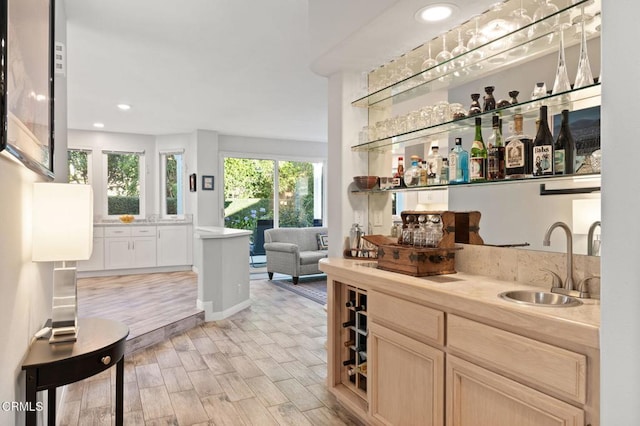 2106 Fox Den Ct, Oxnard, CA 93036 - indoor wet bar with light wood-style floors and recessed lighting