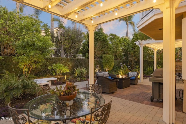 2106 Fox Den Ct, Oxnard, CA 93036 - fenced backyard with an outdoor fire pit, outdoor dining area, and a patio