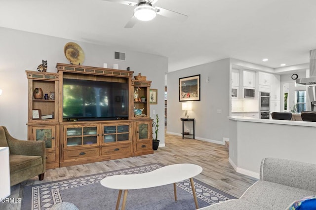 2106 Fox Den Ct, Oxnard, CA 93036 - living room featuring wood finished floors, a ceiling fan, and recessed lighting