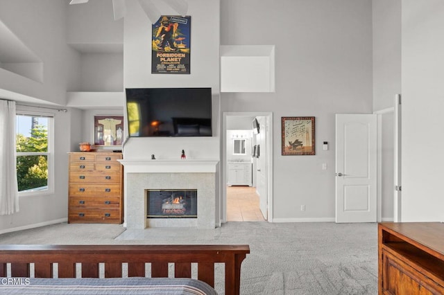 2106 Fox Den Ct, Oxnard, CA 93036 - carpeted bedroom featuring a high ceiling, a premium fireplace, and ensuite bath
