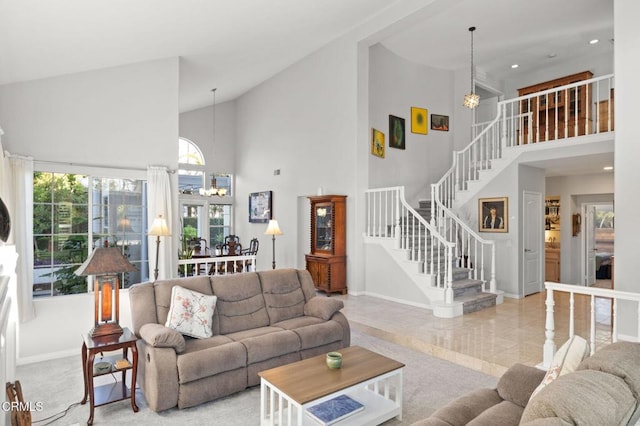 2106 Fox Den Ct, Oxnard, CA 93036 - living room with high vaulted ceiling, stairway, a chandelier, and recessed lighting