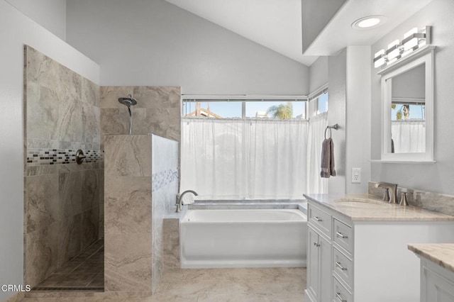 2106 Fox Den Ct, Oxnard, CA 93036 - bathroom with vanity, a bath, a walk in shower, and vaulted ceiling