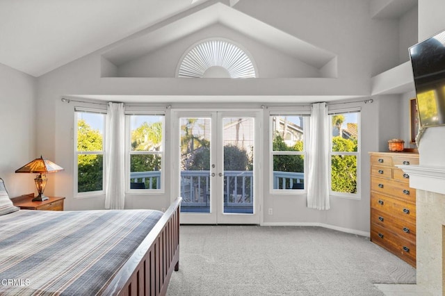 2106 Fox Den Ct, Oxnard, CA 93036 - bedroom featuring lofted ceiling, access to outside, light carpet, multiple windows, and french doors