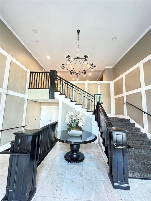 838 Pine Ave Unit 510, Long Beach, CA 90813 - stairway with crown molding, a chandelier, and recessed lighting