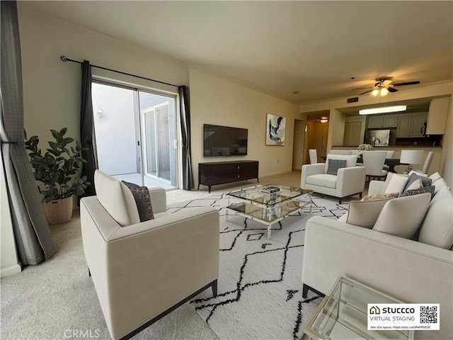 838 Pine Ave Unit 510, Long Beach, CA 90813 - living area featuring light colored carpet, ornamental molding, and a ceiling fan