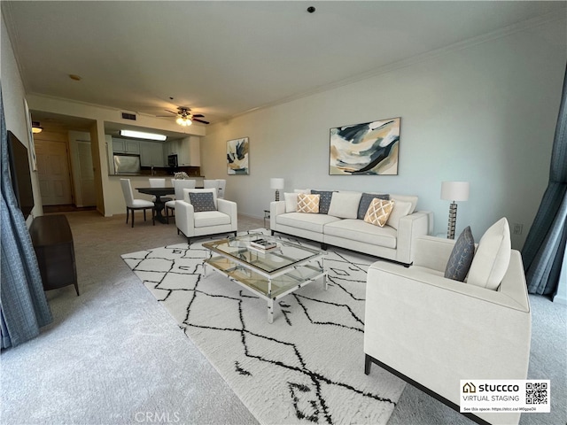 838 Pine Ave Unit 510, Long Beach, CA 90813 - living area with light colored carpet, crown molding, and ceiling fan