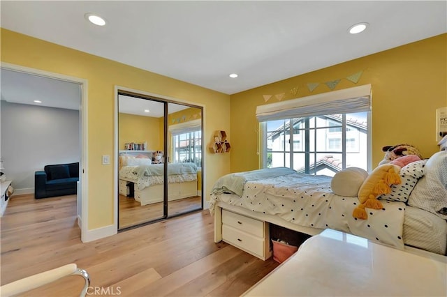 19325 Peachtree Ln, Huntington Beach, CA 92648 - bedroom with recessed lighting and light wood-style flooring