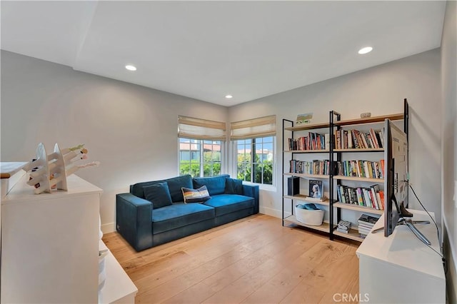 19325 Peachtree Ln, Huntington Beach, CA 92648 - living area with light wood finished floors and recessed lighting