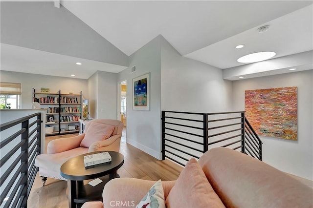 19325 Peachtree Ln, Huntington Beach, CA 92648 - living area with an upstairs landing, wood finished floors, lofted ceiling, and recessed lighting