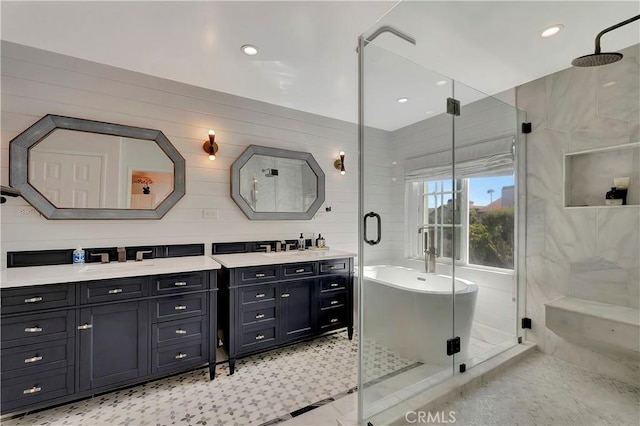 19325 Peachtree Ln, Huntington Beach, CA 92648 - full bathroom with a freestanding bath, double vanity, a shower stall, and recessed lighting