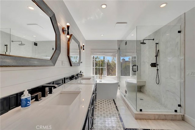 19325 Peachtree Ln, Huntington Beach, CA 92648 - bathroom with a freestanding tub, a stall shower, double vanity, and recessed lighting
