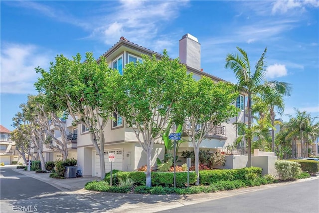 19325 Peachtree Ln, Huntington Beach, CA 92648 - view of building exterior featuring a garage
